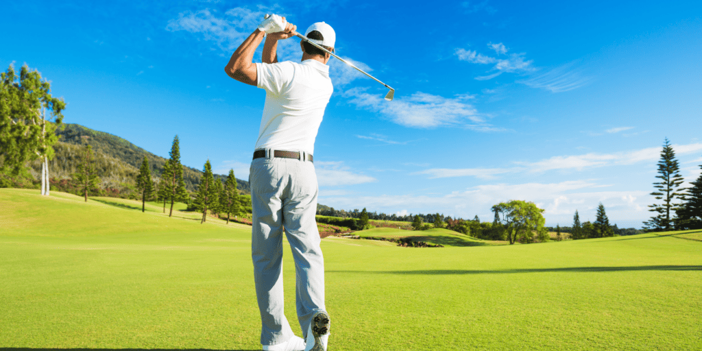 Golfers using Callaway irons on golf course